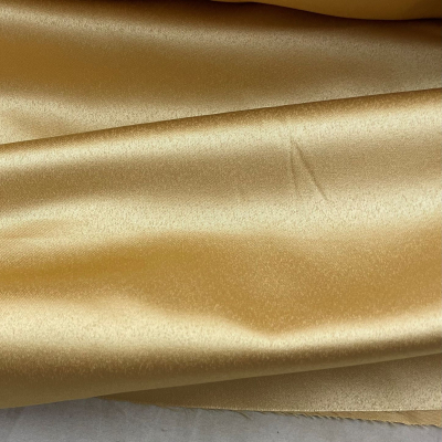 בד סאטן למפות זהב בהיר - רוחב 3 מ'